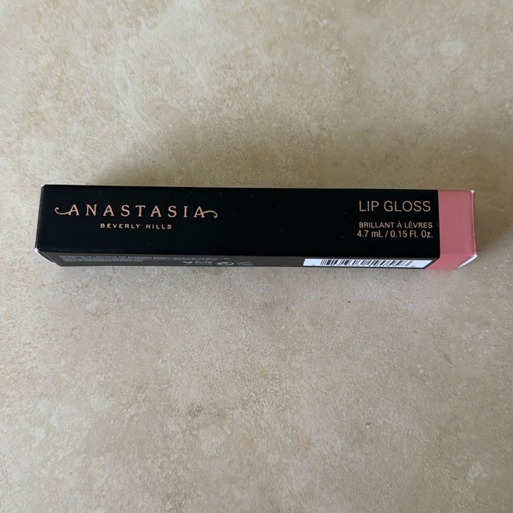 Brand new, never been used Anastasia coral lipgloss.